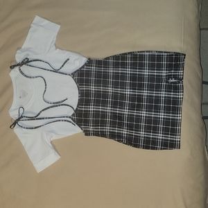 Black and white plaid skirt. (L)